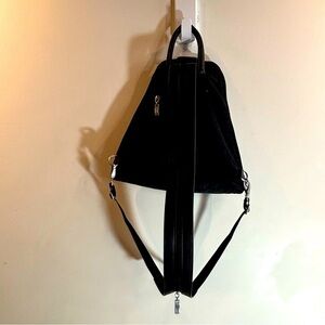 BAGGALLINI Convertible To Sling Multiple Pockets with Safety Wristlet Backpack